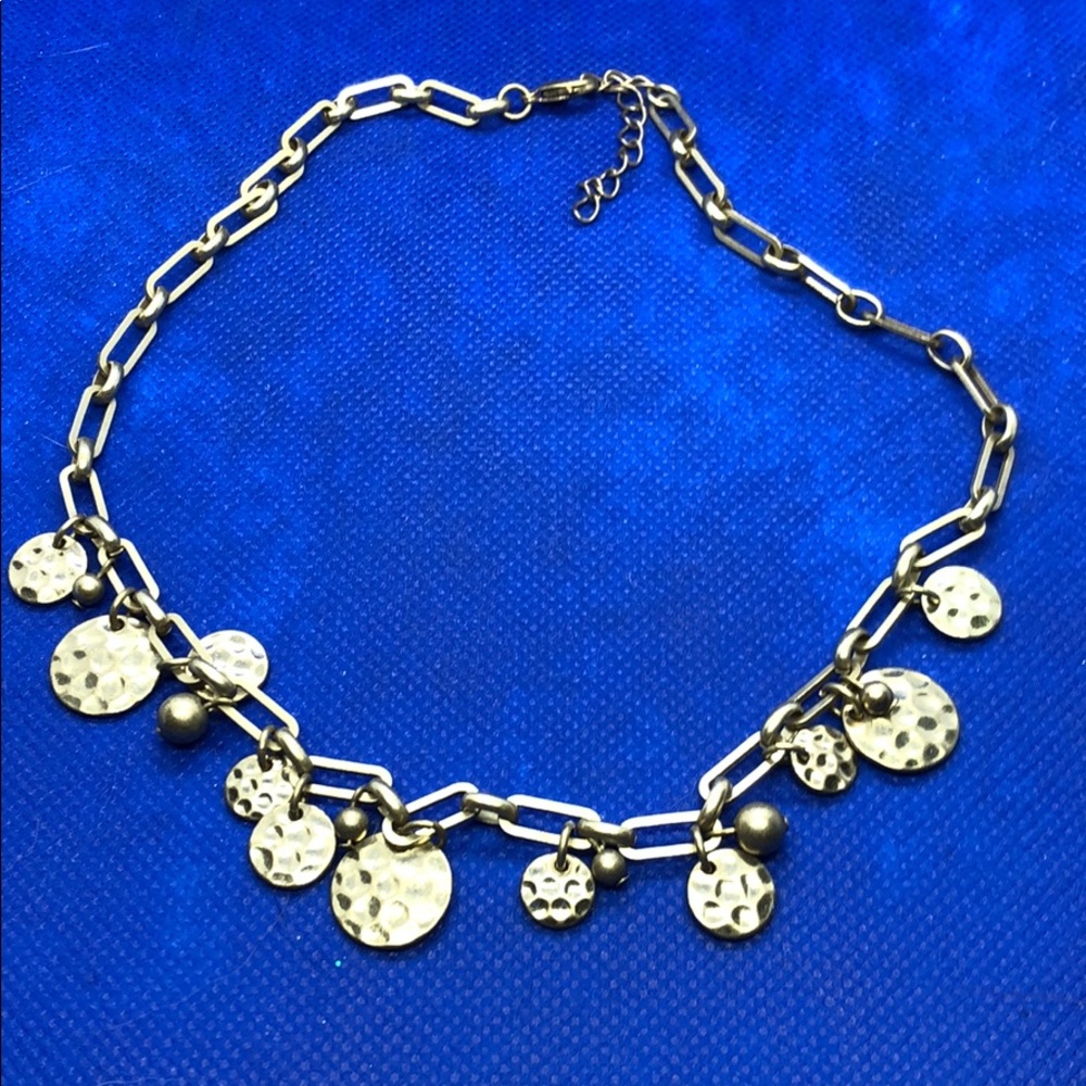 Gold and grey fake pearl necklace.
